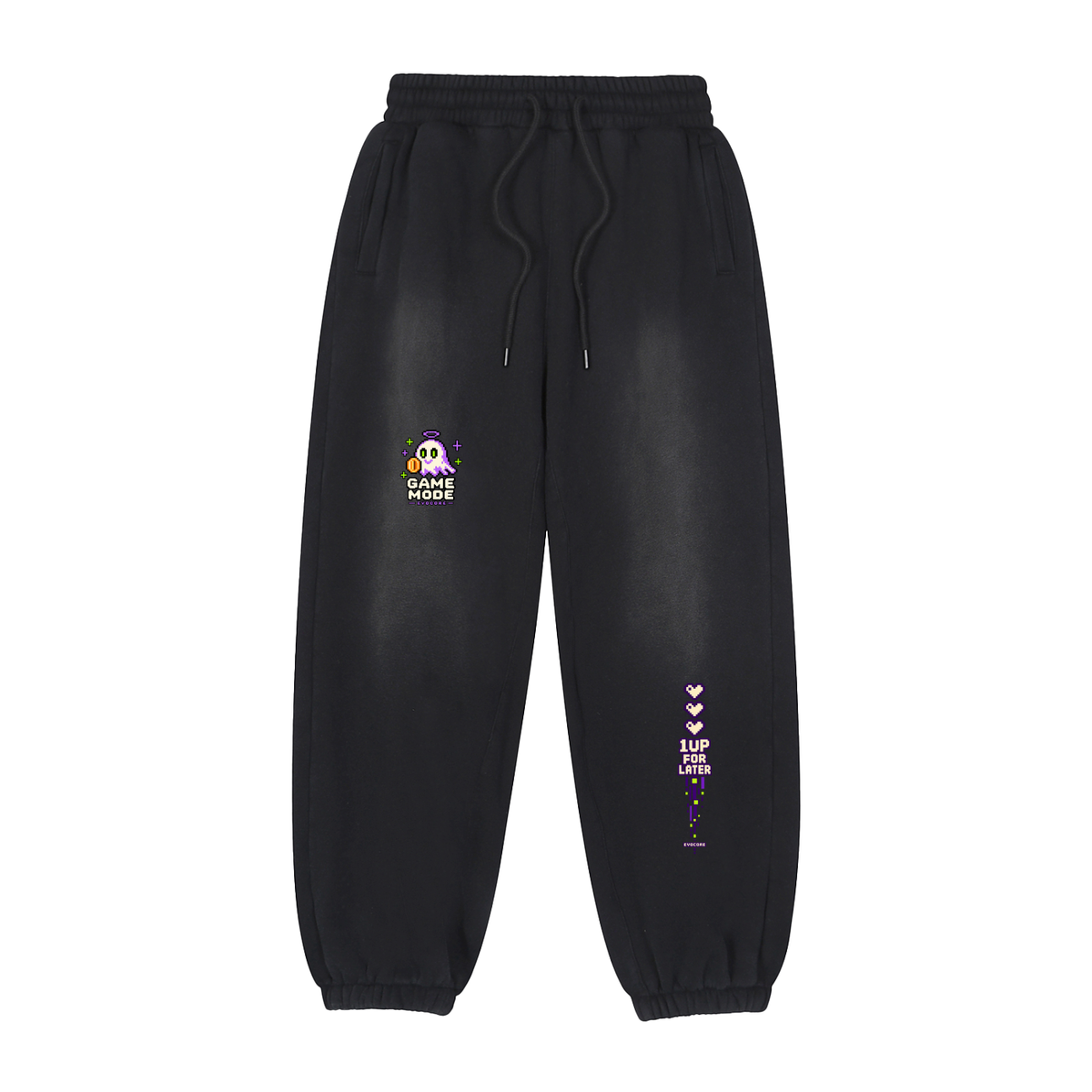 Front of EvoCore Phantom Arcade Joggers in washed black, with a Game Mode ghost graphic on the front thigh and a 1UP For Later heart stack on the lower leg.