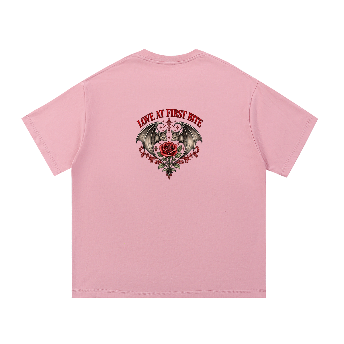 EvoCore Love at First Bite Graphic Tee in Pink, back view showing large red rose and bat-wing emblem beneath Love at First Bite lettering.