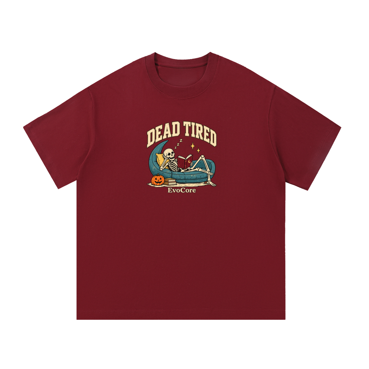 EvoCore Dead Tired Club Graphic Tee in Wine Red, front view showing Dead Tired lettering above a skeleton reading on a teal chaise.