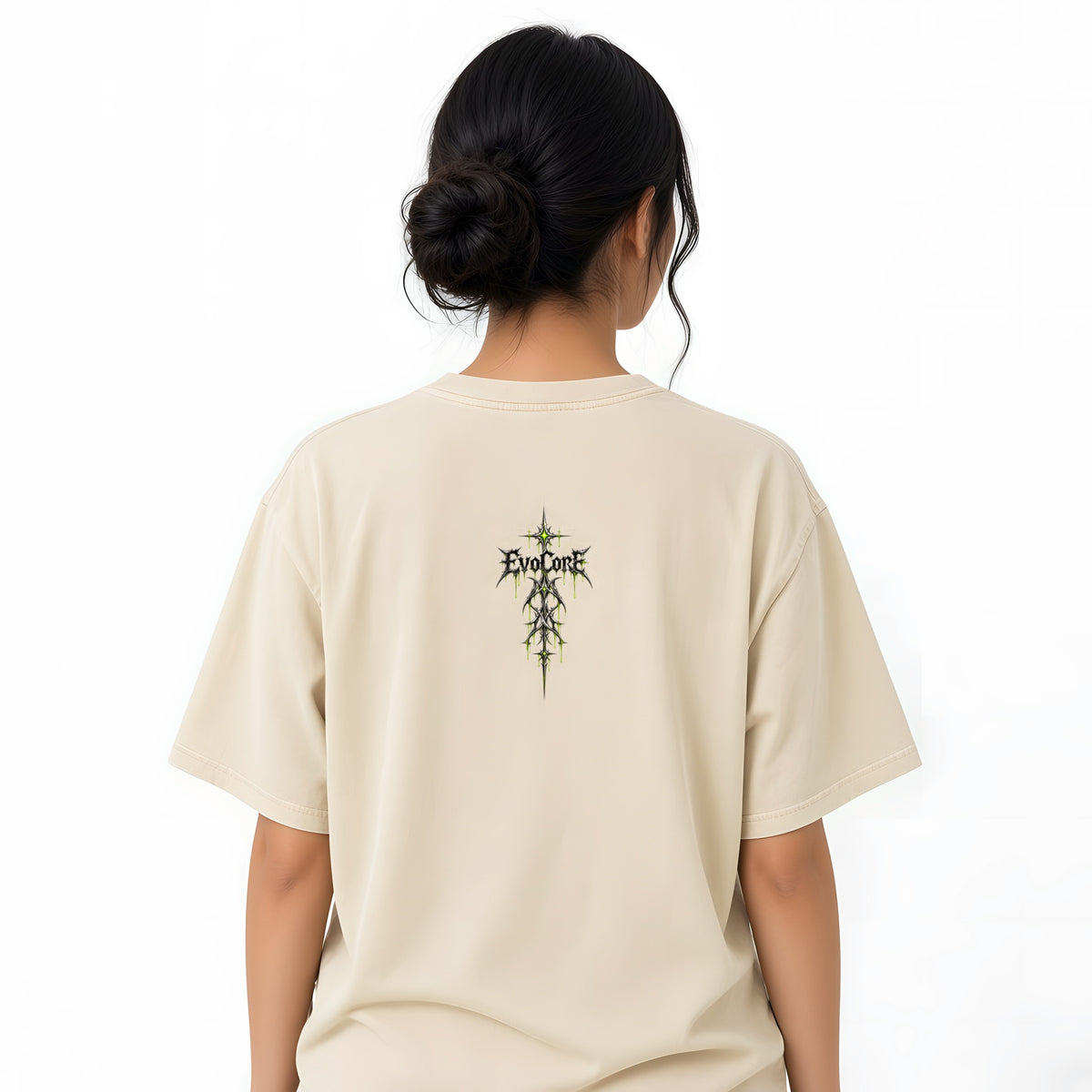 EvoCore Chrome Venom Greenwire Tee in Apricot, back view worn by a model, white studio