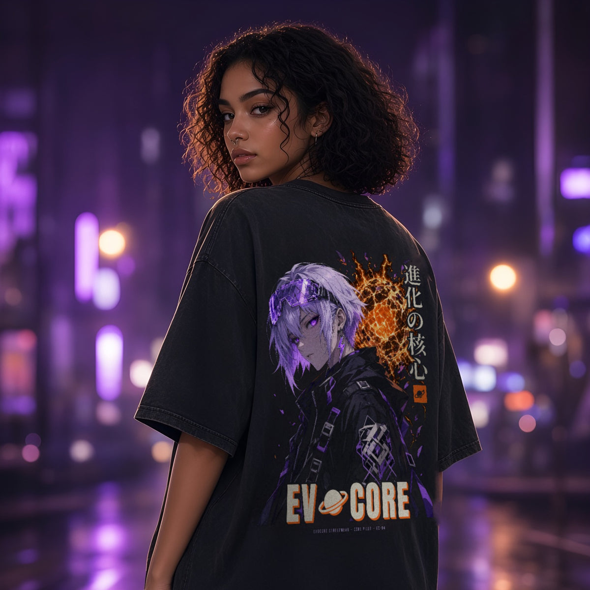 Over-the-shoulder look at the oversized EvoCore Core Pilot Tee on a wet street with purple bokeh, full-back pilot print