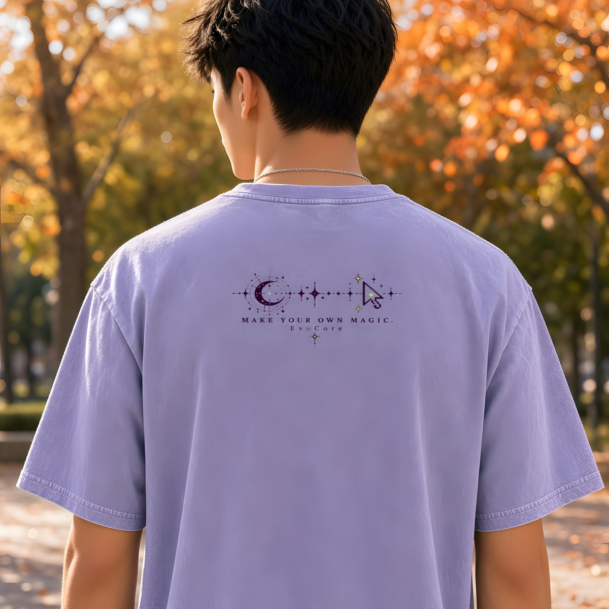 EvoCore HEX.EXE Dream Cache Tee in Light Purple, back view worn by a model, autumn park