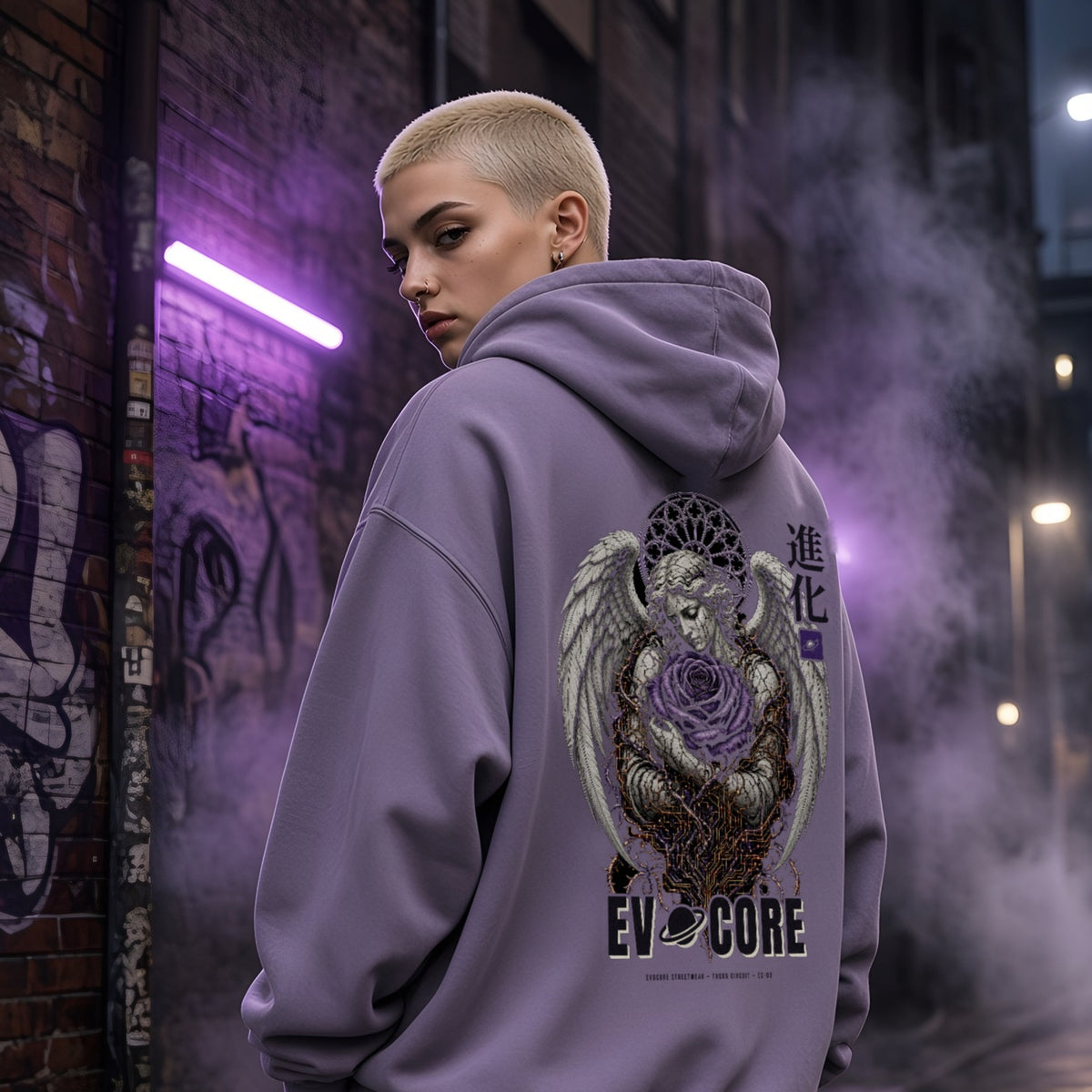 Over-the-shoulder look at the EvoCore Thorn Circuit Hoodie in lavender in a smoky violet-lit alley, full-back angel and rose print