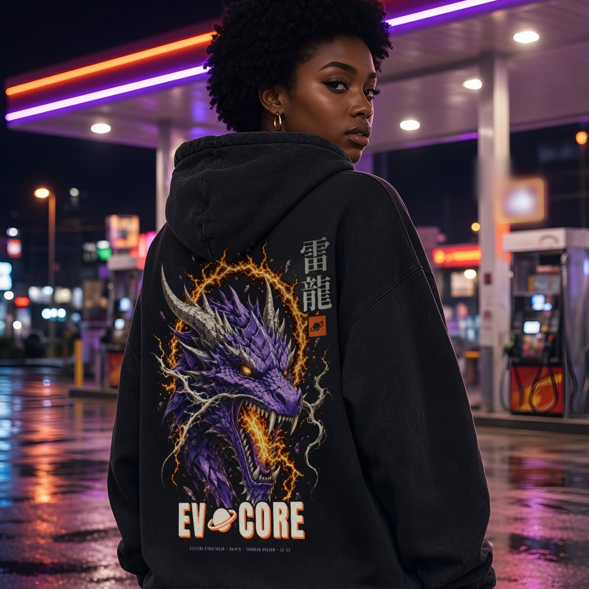 Over-the-shoulder look at the EvoCore Thunder Dragon Hoodie at a neon-lit gas station at night, full-back purple dragon print