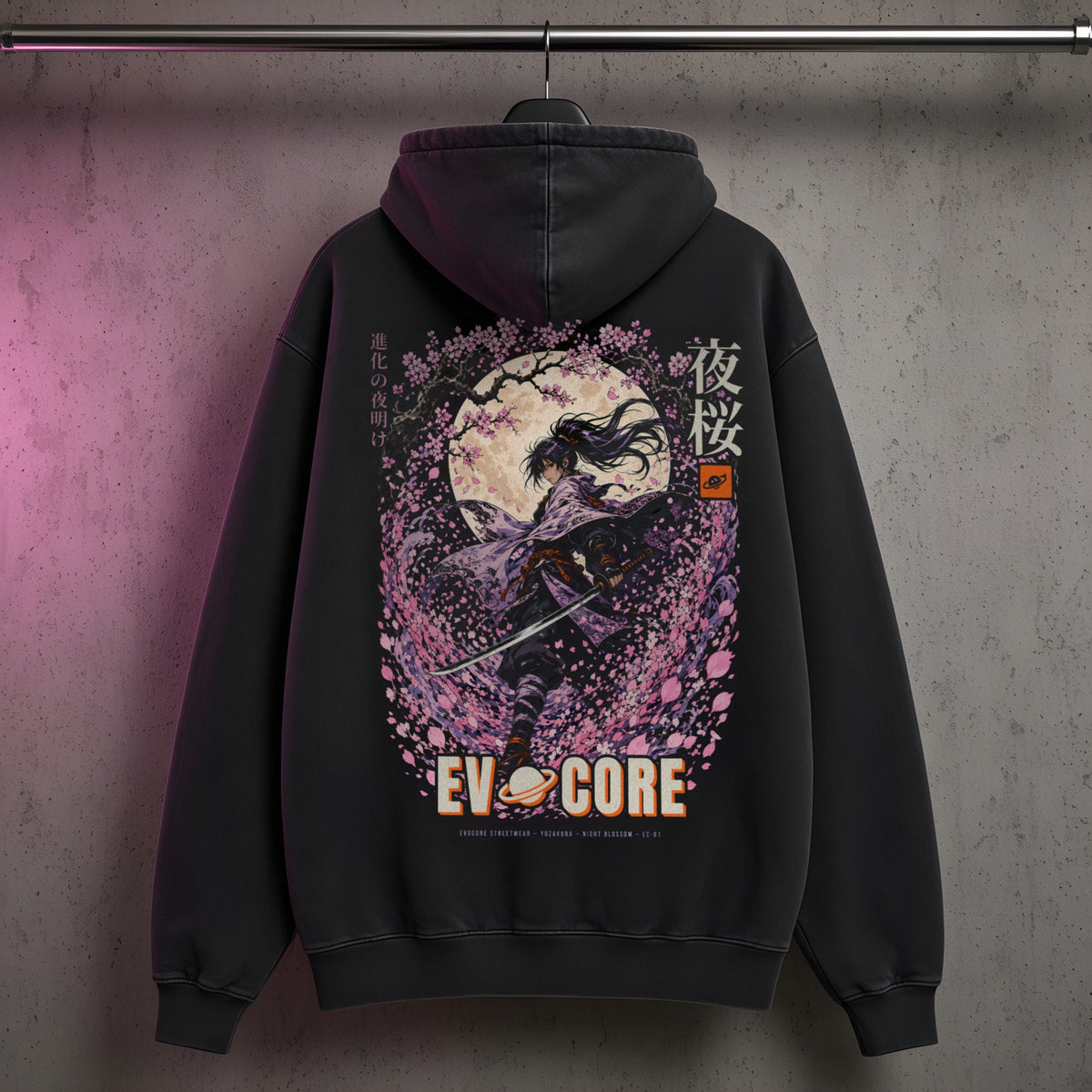 EvoCore Yozakura Hoodie hanging on a rail against a concrete wall, showing the full-back sakura moon samurai print